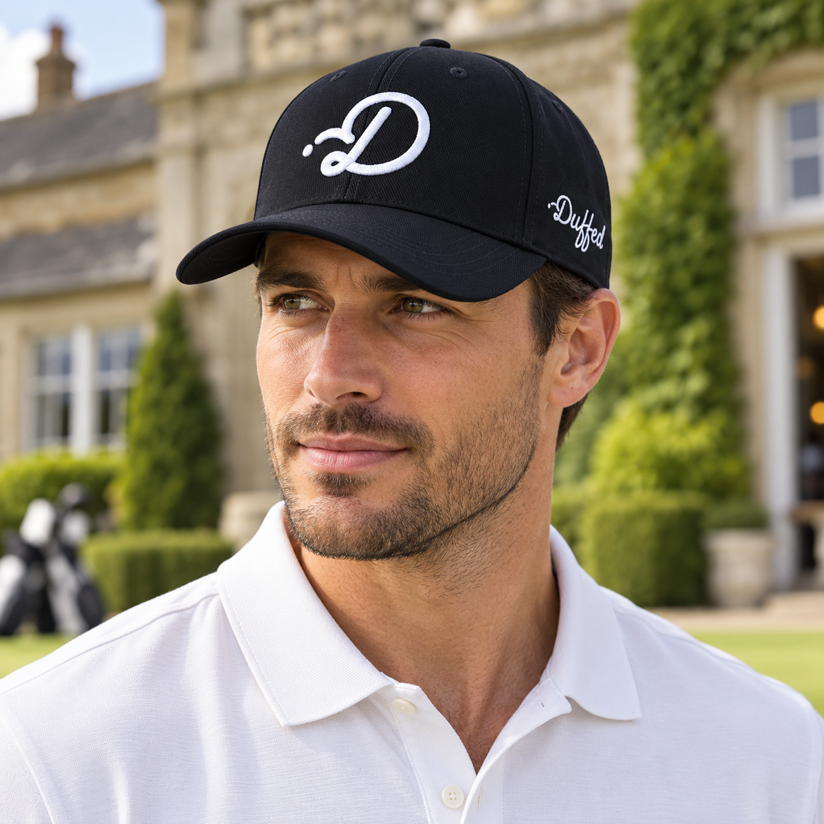 Duffed Obsidian D Cap — male lifestyle portrait at the clubhouse