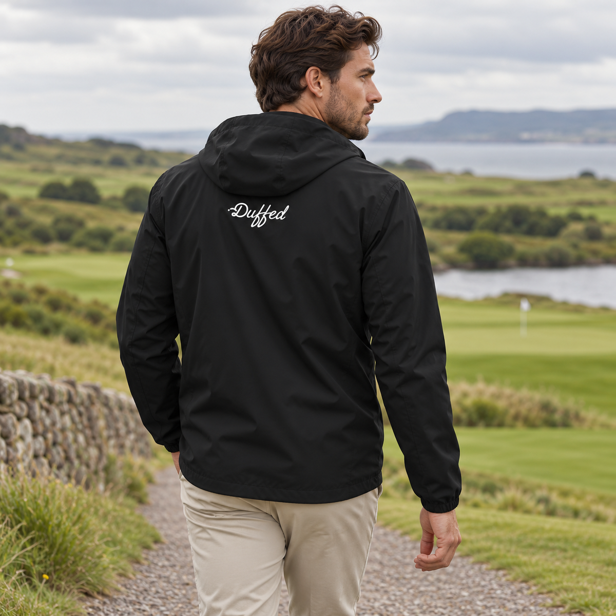 Duffed Onyx Hooded Sports Jacket — back view worn by a male model