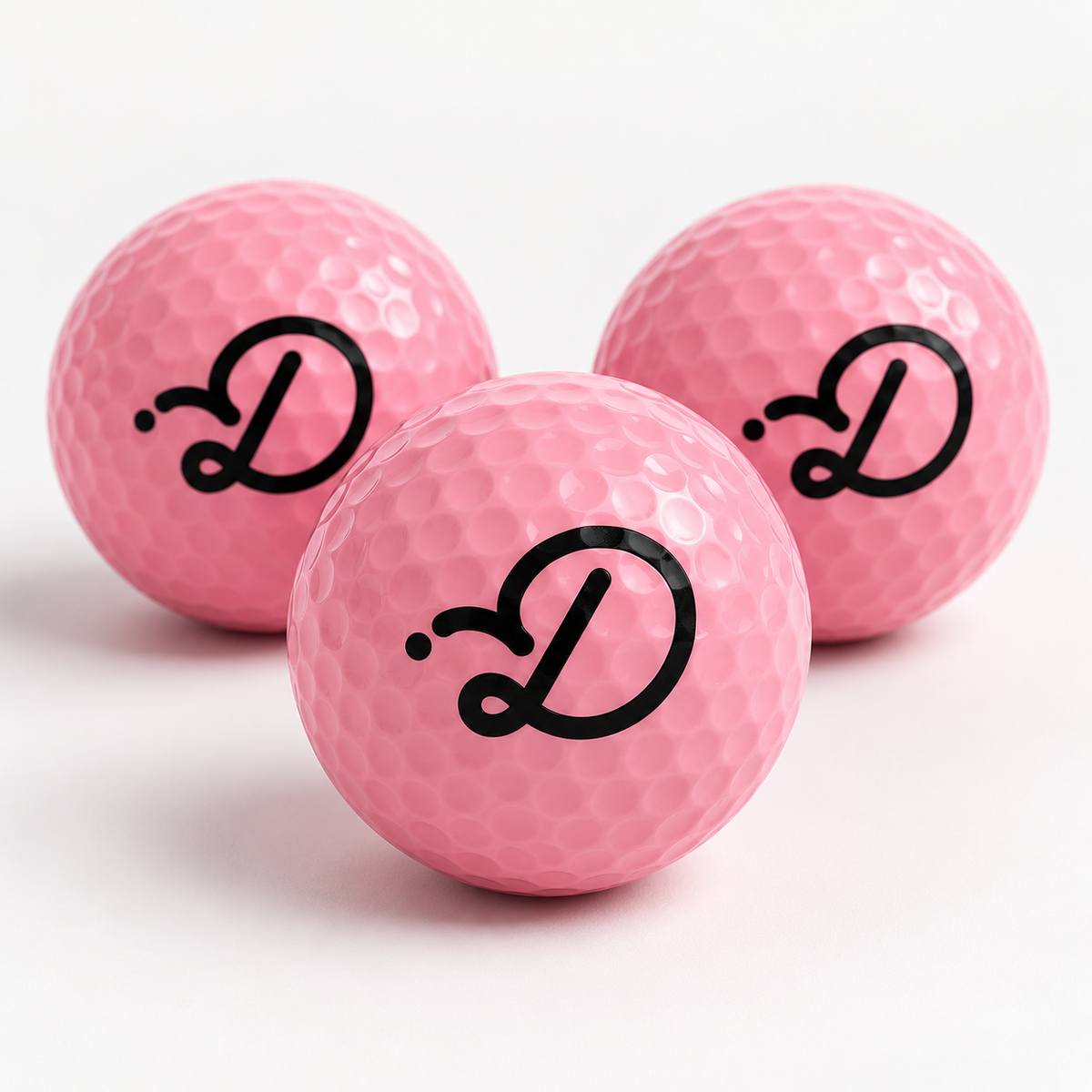 Duffed Pink D Golf Balls — Pink colour option with black Duffed D logo