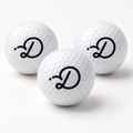 White Duffed golf balls with black D monogram